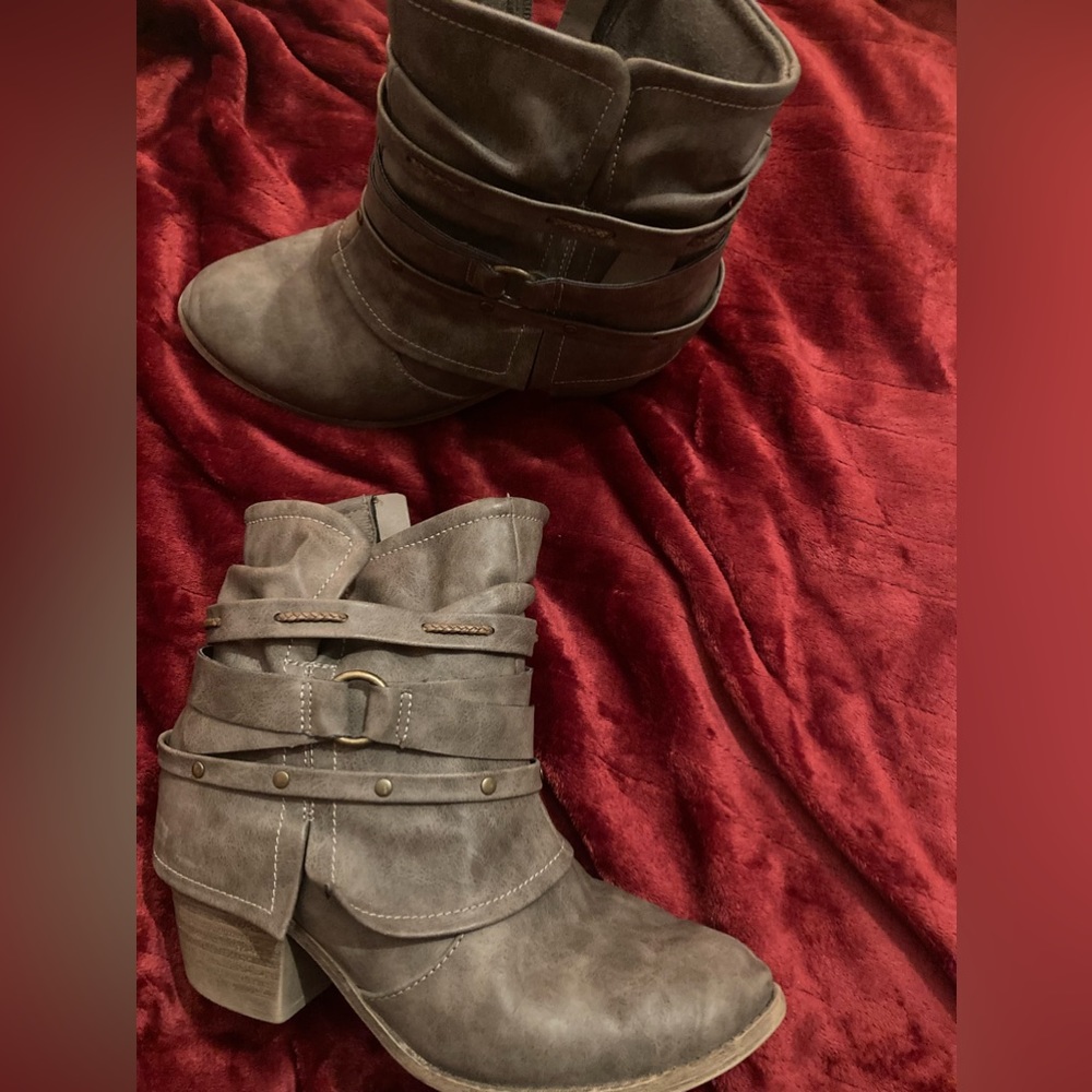 Heeled booties have a 1-2 in heel with 3 little straps